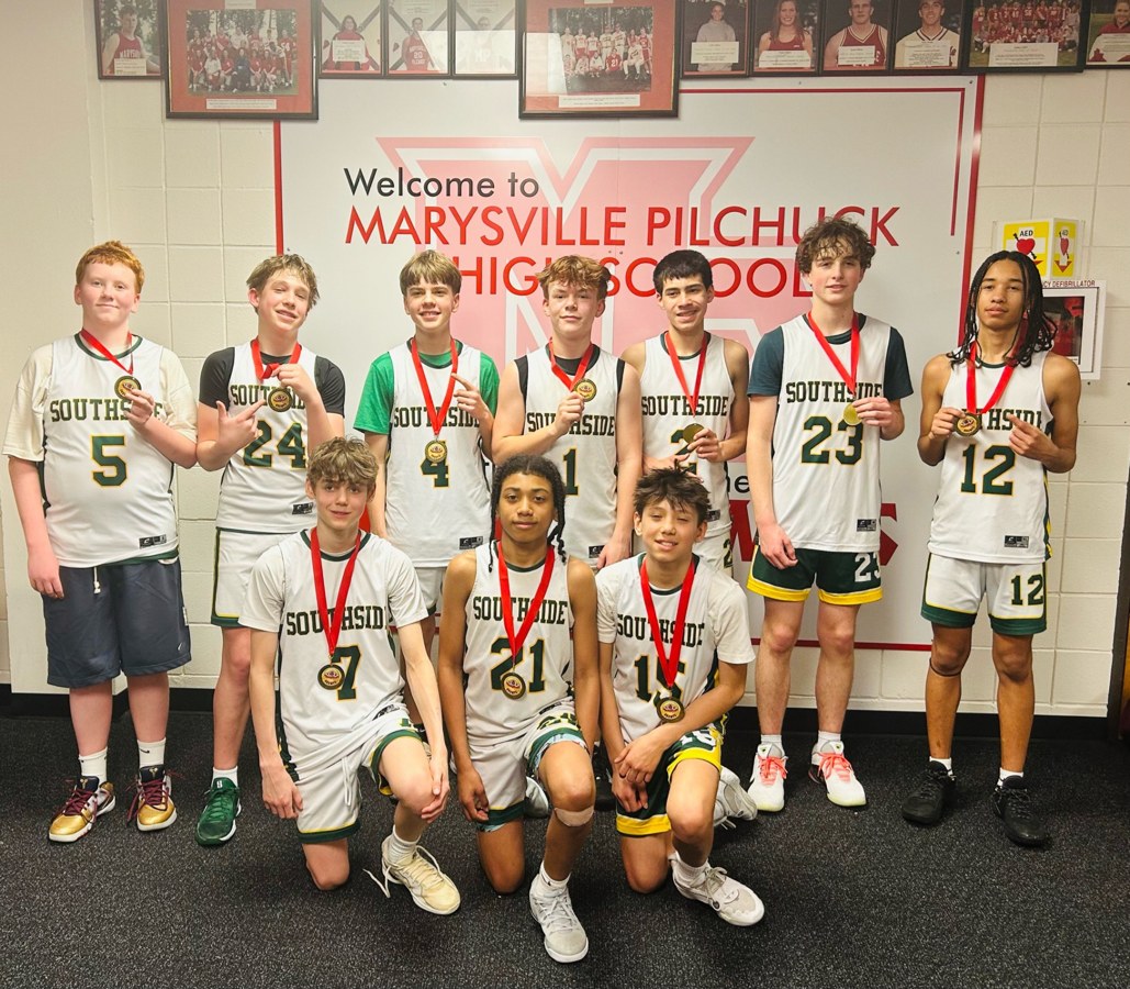 Southside youth basketball players wearing medals